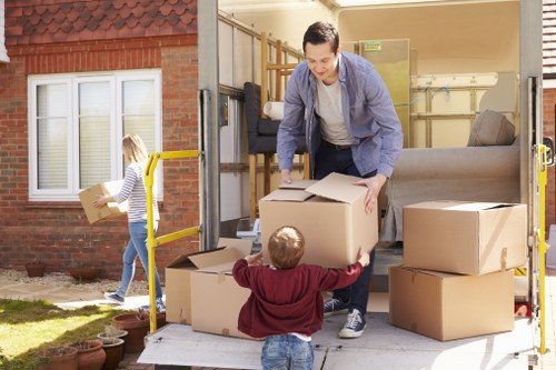 Professional movers navigating tight access during a Coventgarden relocation