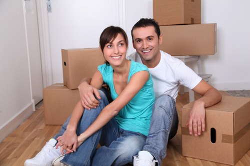 Removal team handling furniture during a house move in Covent Garden