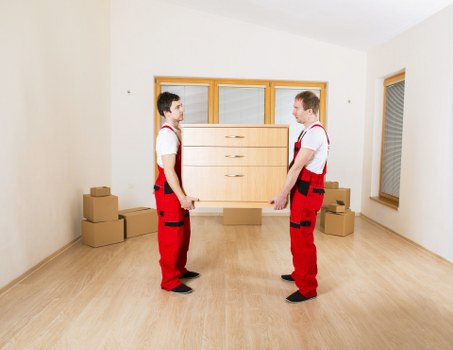 Team using PPE and moving tools during a safe relocation in Covent Garden